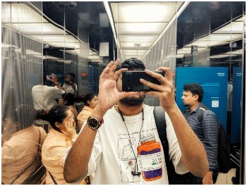 self portrait in a mall elevator